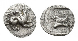 TROAS. Assos. Teteartemorion (Circa 480-450 BC). 0.2g 6.6mm Obv: Griffin crouching right. Rev: Astragalos within incuse square.