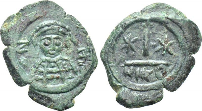 MAURICE TIBERIUS (582-602). Decanummium. Nicomedia. 

Obv: Crowned and cuirass...