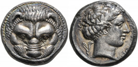 BRUTTIUM. Rhegion. Circa 415/0-387 BC. Tetradrachm (Silver, 23 mm, 16.75 g, 7 h). Facing head of a lion. Rev. ΡHΓINON Head of Apollo to right, wearing...