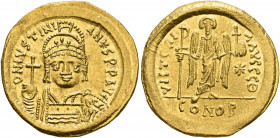 Justinian I, 527-565. Solidus (Gold, 20 mm, 4.50 g, 6 h), Constantinopolis, 545-565. D N IVSTINI-ANVS P P AVG Helmeted and cuirassed bust of Justinian...