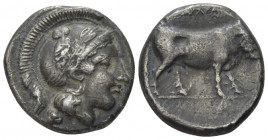 Campania , Nola Didrachm circa 400-385, AR 19.00 mm., 7.19 g.
Head of Athena facing r. wearing crested Athenian helmet decorated with owl and laurel ...