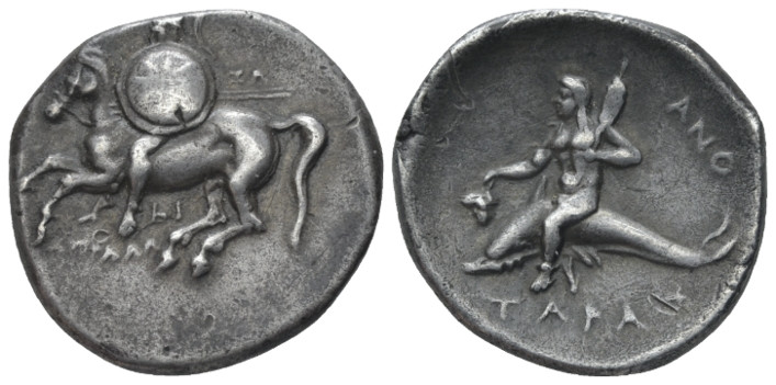 Calabria, Tarentum Nomos circa 280-272, AR 22.00 mm., 6.43 g.
 Warrior, holding...