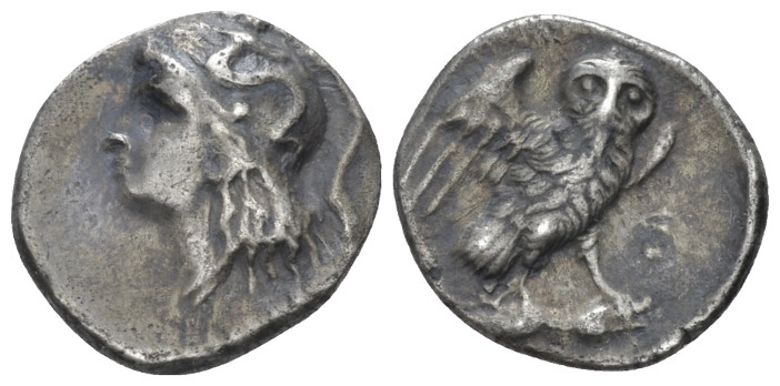 Calabria, Tarentum Drachm circa 280-272, AR 17.00 mm., 3.09 g.
Head of Athena l...