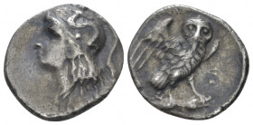 Calabria, Tarentum Drachm circa 280-272, AR 17.00 mm., 3.09 g.
Head of Athena l., wearing Attic helmet, decorated with Scylla. Rev. Owl standing r., ...