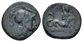 Lucania, Heraclea Bronze circa III-I centuries BC, Æ 15.00 mm., 2.32 g.
 Helmeted head of Athena r. Rev. Marine deity r., holding shield and spear. V...