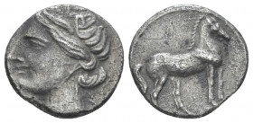 Bruttium, Locri (The Carthaginians in Magna Grecia) Quarter of shekel circa 215-205, AR 13.00 mm., 1.74 g.
Head of Tanit-Demeter l., wearing barley w...