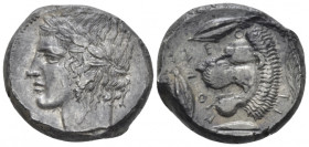 Sicily, Leontini Tetradrachm circa 430-425 BC, AR 25.00 mm., 17.40 g.
Laureate head of Apollo l. Rev. Head of lion l., with open mouth; around three ...