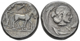 Sicily, Syracuse Tetradrachm circa 480-475, AR 23.00 mm., 17.39 g.
Slow quadriga driven r. by charioteer holding kentron and reins; above, Nike flyin...