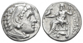 Kingdom of Macedon, Alexander III, 336 – 323 and posthmous issues Colophon Drachm struck under Philip III circa 323-319, AR 17.00 mm., 4.19 g.
 Head ...