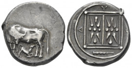 Illyricum, Dyrrachium Stater circa 450-350, AR 21.00 mm., 10.89 g.
Cow suckling calf, head reverted. Rev. Floral pattern within linear square; in exe...