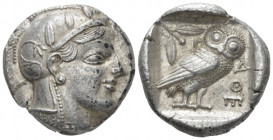 Attica, Athens Tetradrachm circa 455, AR 25.00 mm., 17.18 g.
Head of Athena r., wearing crested helmet decorated with olive leaves and spiral palmett...
