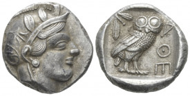 Attica, Athens Tetradrachm after 449, AR 24.00 mm., 16.84 g.
Head of Athena r., wearing Attic helmet decorated with olive leaves and palmette. Rev. O...