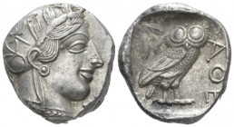 Attica, Athens Tetradrachm After 449, AR 24.00 mm., 17.18 g.
Head of Athena r., wearing Attic helmet decorated with olive leaves and palmette. Rev. O...