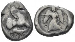 Elis, Olympia Stater circa 450-440, AR 24.00 mm., 11.96 g.
 Eagle flying r., grasping hare with its talons and tearing at it with its beak. Rev. Nike...
