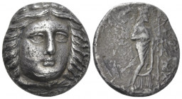 Satraps of Caria, Maussolus, 377 – 353 Halicarnassus Tetradrachm after 367, AR 24.00 mm., 13.76 g.
Laureate head of Apollo facing three-quarters r. R...