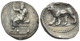 The Seleucid Kings, Seleucus I Nicator, 312- 281 BC Babylon Tetradrachm circa 311-305, AR 22.00 mm., 15.66 g.
Baal seated l., holding sceptre in r. h...