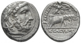 The Seleucid Kings, Seleucia on the Tigri Tetradrachm circa 296-295, AR 24.00 mm., 15.95 g.
Laureate head of Zeus r. Rev. Athena in quadriga of eleph...