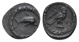 Phoenicia, Tyre 1/24 shekel circa 393-310, AR 8.00 mm., 0.42 g.
Dolphin r. Rev. Owl standing r., head facing, with flail and crook over l. shoulder. ...