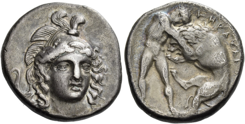 Lucania, Heraclea 
Nomos circa 390-340, AR 7.48 g. Head of Athena facing three-...