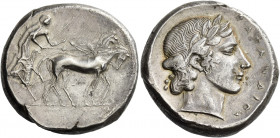 Catana 
Tetradrachm signed by Kra....circa 450-445, AR 17.26 g. Charioteer driving slow quadriga r., holding kentron and reins. On the chariot, the s...