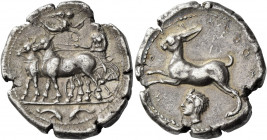 Messana 
Tetradrachm circa 412-408, AR 16.91 g. Biga of mules driven l. by nymph Messana; above, Nike flying r. to crown the nymph. In exergue, two d...