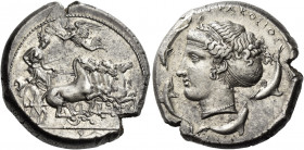 Syracuse 
Tetradrachm signed by Euainetos and Eukleidas circa 425-413, AR 17.54 g. Fast quadriga driven r. by charioteer holding reins and kentron. A...