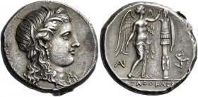 Syracuse 
Tetradrachm circa 310-305, AR 17.07 g. ΚΟΡΑΣ Head of Kore-Persephone r., wearing barley wreath, earring with drop pendant and necklace; hai...