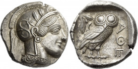 Attica, Athens 
Tetradrachm circa 431, AR 17.18 g. Head of Athena r., wearing crested helmet decorated with olive leaves and spiral palmette. Rev. ΑΘ...