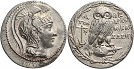 Attica, Athens 
Tetradrachm circa 134-133, AR 16.87 g. Head of Athena r., wearing crested Attic helmet, bowl decorated with tendrils, griffin and the...