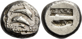 Islands off Caria, Carpathos 
Stater circa 500-480, AR 13.90 g. Two dolphins leaping in opposite directions and a third smaller one swimming r. below...