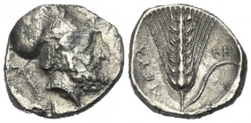Lukanien. Metapont.

 Stater (Silber). Ca. 340 - 330 v. Chr.
Vs: Kopf des Leukippos mit korinthischem Helm rechts, dahinter Kreuzfackel.
Rs: META....