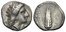 Lukanien. Metapont.

 Nomos oder Tridrachme (Silber). Ca. 330 - 290 v. Chr.
Vs: Kopf der Demeter mit Ähenkranz rechts.
Rs: META. Getreideähre. 
...