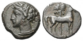Sizilien. Sikulo-punische Prägungen.

 Bronze. Ca. 310 - 280 v. Chr.
Vs: Kopf der Tanit mit Ährenkranz links.
Rs: Pferd nach rechts stehend, dahin...