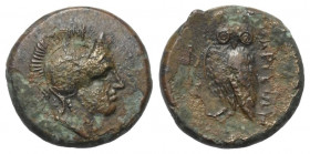 Akarnanien. Argos Amphilochikon.

 Bronze. 4. - 3. Jhdt. v. Chr.
Vs: Kopf der Athena mit attischem Helm rechts.
Rs: Eule nach links stehend, Kopf ...