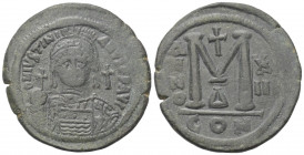 Iustinianus I. (527 - 565 n. Chr.).

 Follis (40 Nummi). Constantinopolis.
Vs: D N IVSTINI-ANVS P P AVC. Büste mit Helm, Diadem, Panzer, Kreuzglobu...