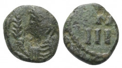 Vandalen. Anonym.

 4 Nummi (Kupfer). ca. 480 - 533 n. Chr. Karthago.
Vs: Drapierte und kürassierte Büste links, einen Zweig haltend.
Rs: N über I...