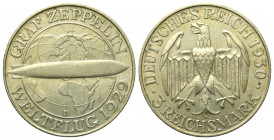 Weimarer Republik.

 5 Reichsmark (Silber). 1930 D. München.
Auf den Weltflug des Luftschiffes Graf Zeppelin 1929.
Vs: Luftschiff vor Globus.
Rs:...
