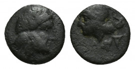 AEOLIS. Autokane. Ae (3rd century BC). 0.6g 8.4mm Obv: Laureate head of Zeus right. Rev: AYTOKA. Helmeted head of Athena left.