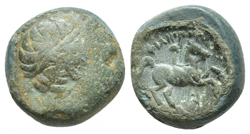 KINGS OF MACEDON. Philip II (359-336 BC). 5.5g 14.9mm Ae. Obv: Diademed head of ...