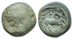 KINGS OF MACEDON. Philip II (359-336 BC). 5.5g 14.9mm Ae. Obv: Diademed head of Apollo right. Rev: ΦIΛIΠΠOY. Youth on horseback right. Control: below ...