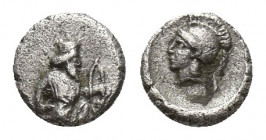 Achaemenid Empire. Uncertain mint in Cilicia circa 400 BC. Tetartemorion AR 5 mm., 0,2 g. 5.5mm Persian king or hero in kneeling-running stance right,...