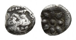 Greek Coins AR 0.1g 4.4mm Obv: Lion ? Facing Rev: Stellate floral pattern within incuse square