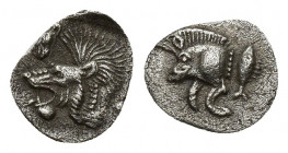 MYSIA, Kyzikos. Circa 525-475 BC. AR Obol (7.5mm, 0.2 g). Forepart of boar left; K (retrograde) on shoulder, tunny behind / Head of roaring lion left;...