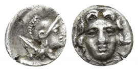 Pisidia. Selge circa 300-190 BC. Obol AR 10mm., 0,8g. Facing Gorgoneion / Helmeted head of Athena right, spear over shoulder and pellet behind.