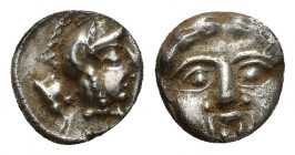 Pisidia, Selge, Obol, 1gr, 9.1mm. 350-300 BC Obverse: facing gorgoneion Reverse: head of Athena in corynthian helmet right astragalos to left