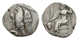 CILICIA. Uncertain. Obol (4th century BC). 0.8g 10.9mm Obv: Baaltars seated left, holding grain ear, grapes and sceptre. Rev: Eagle standing left on P...