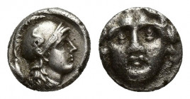 Pisidia, Selge, Obol, 1.1gr, 8.6mm. 350-300 BC Obverse: facing gorgoneion Reverse: head of Athena in corynthian helmet right astragalos to left
