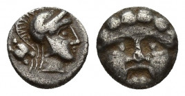 Pisidia, Selge, Obol, 0.5gr, 8.9mm. 350-300 BC Obverse: facing gorgoneion Reverse: head of Athena in corynthian helmet right astragalos to left