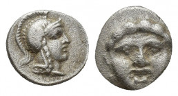 Pisidia, Selge, Obol, 1gr, 10.3mm. 350-300 BC Obverse: facing gorgoneion Reverse: head of Athena in corynthian helmet right