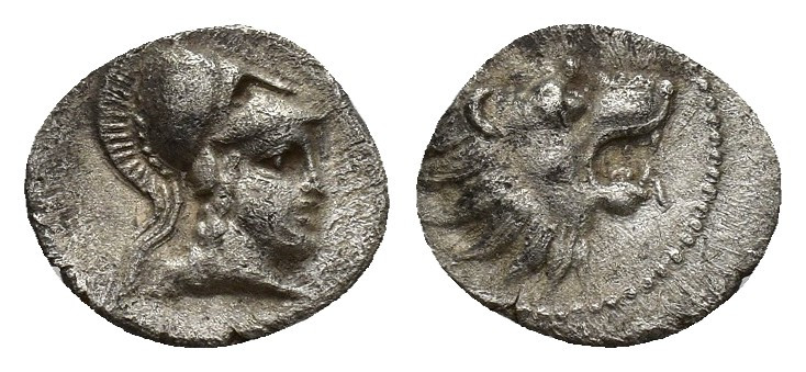 Pamphylia, AR Obol Side ca. 400-380 BC. 0.7g 9.9mm Head of lion right / Helmeted...